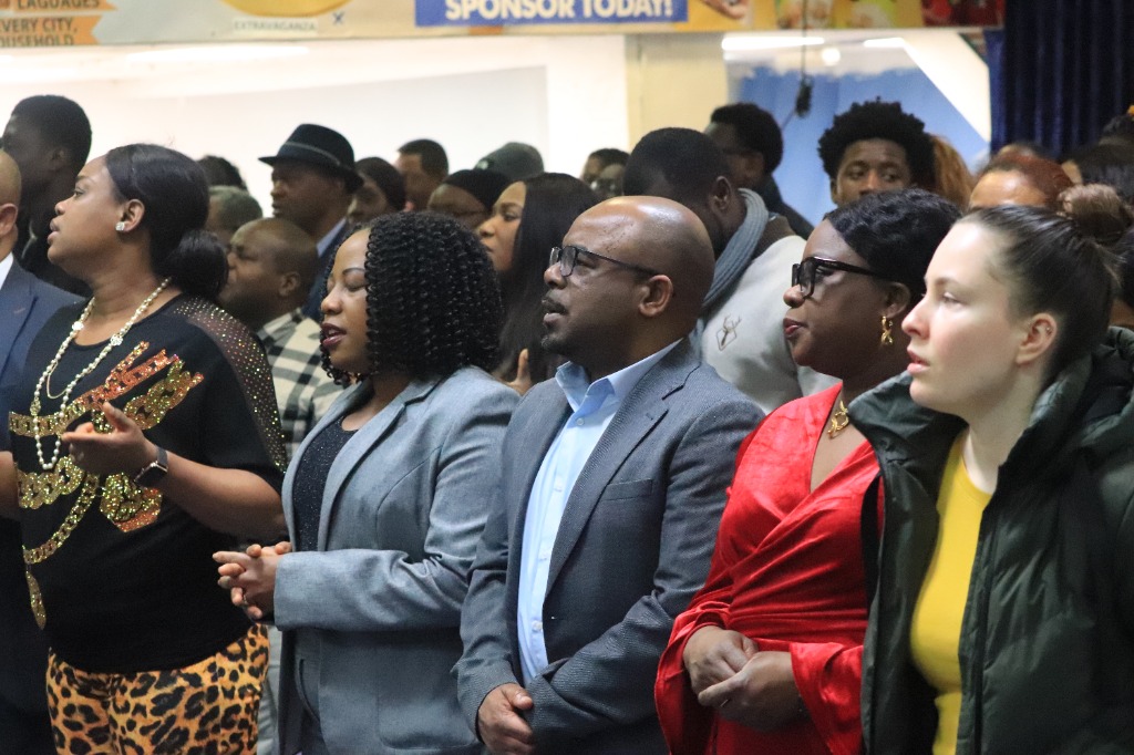 Congregation worshipping at Loveworld Birmingham